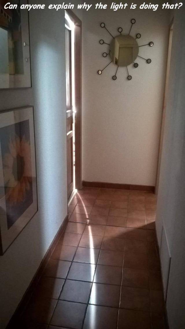 floor - Can anyone explain why the light is doing that?