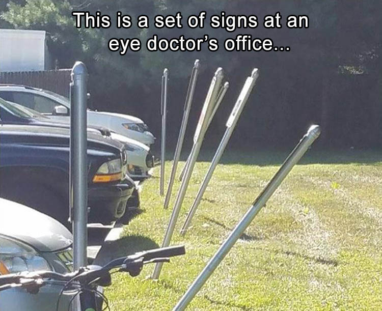 eye clinic parking lot - This is a set of signs at an eye doctor's office...