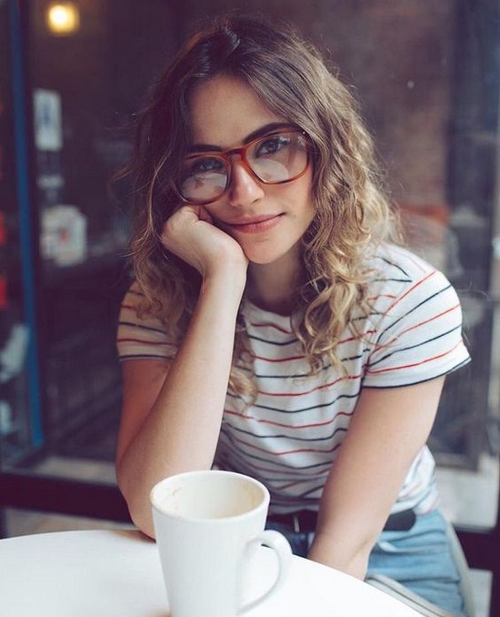 girl with glasses and coffee