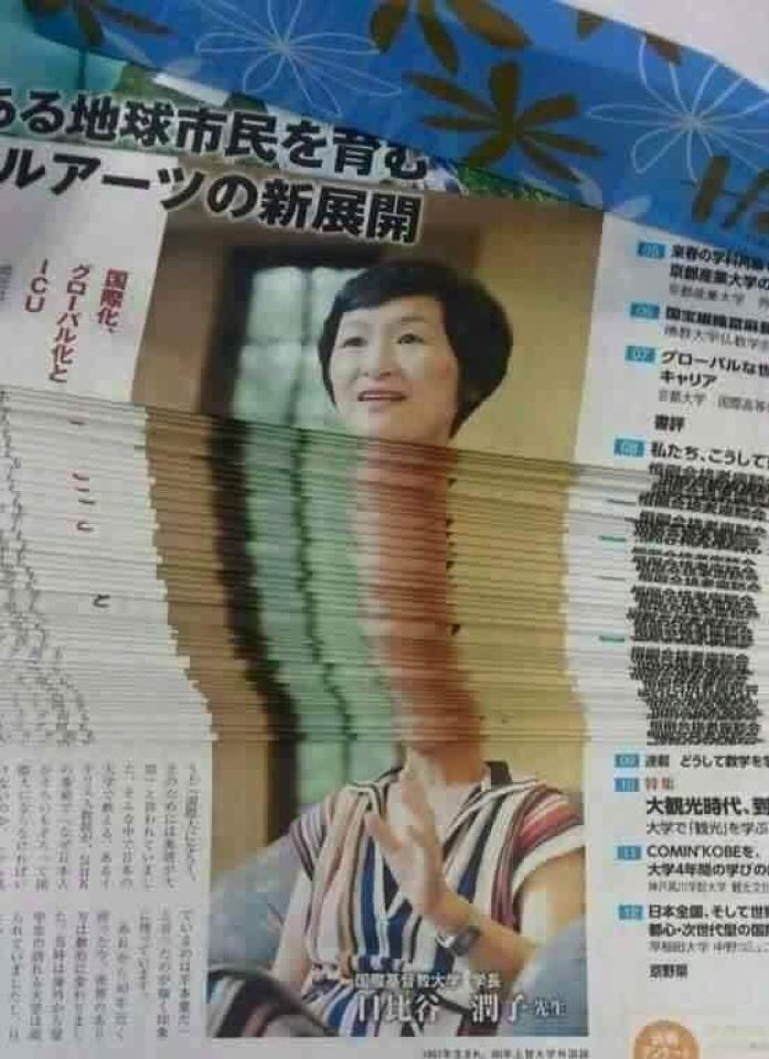 funny picture of woman on the cover of a stack of newspapers and it looks like she has real long neck