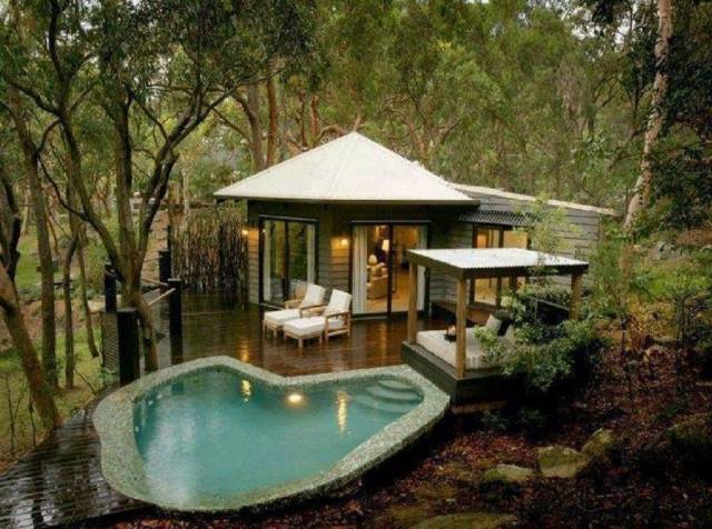 house in the woods with pool