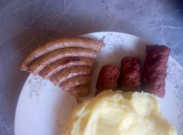 Funny picture of sausages made to look like the symbols for wifi on your phone.