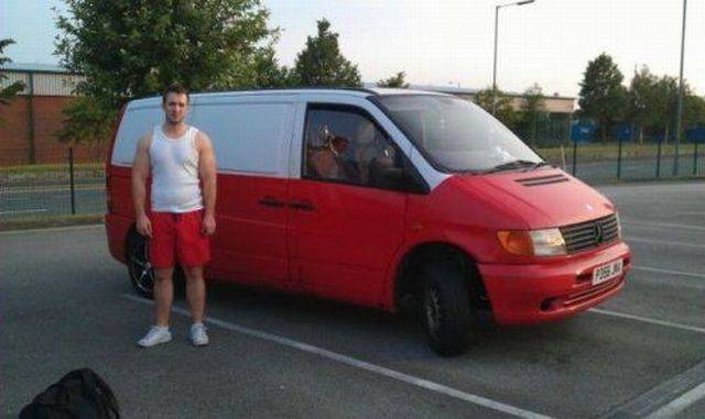 Guy standing next to a red and white van wearing the same color outfit.