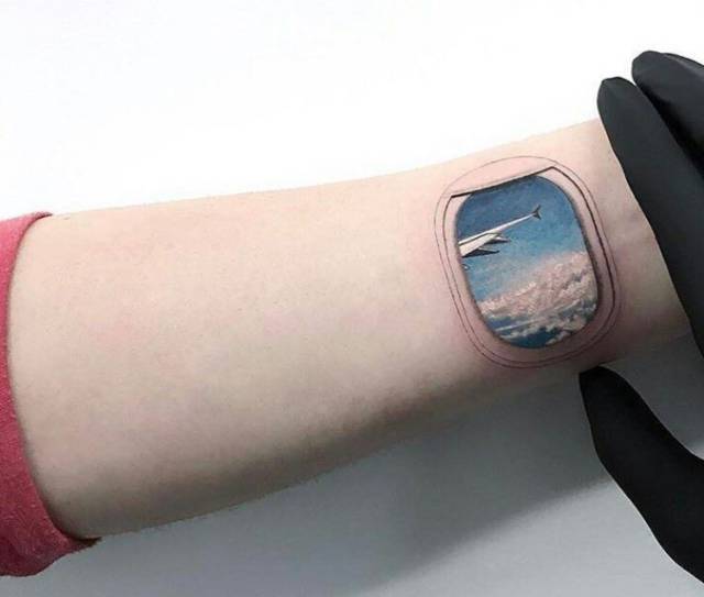 plane window tattoo