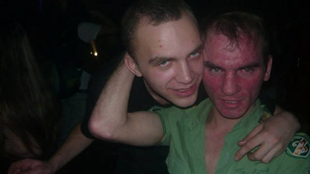 Cringeworthy Russian party pics of 2 dudes and one's face is very red