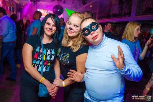 Cringeworthy Russian party pics of turtle necks and strange face paint