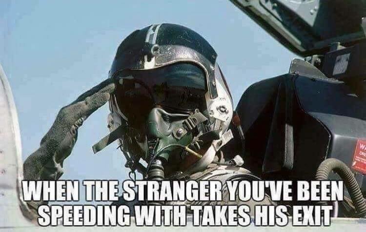 Fighter pilot giving the salute as the feeling when the stranger you've been speeding with takes his exit.