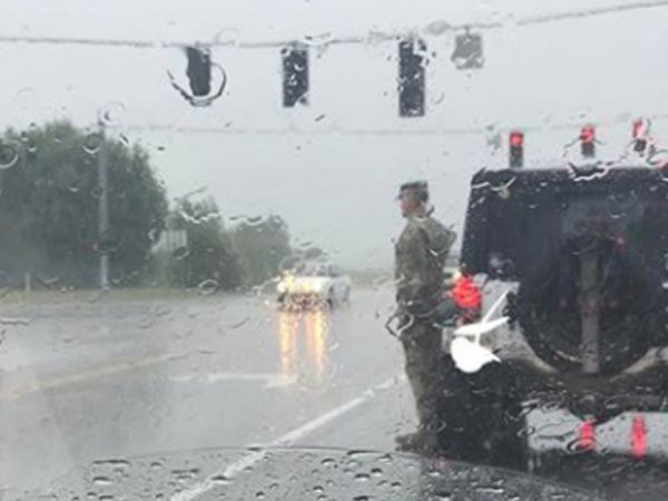 As the rain came down over Kentucky, Erin Hester came to a stop behind a Jeep to make way for a military funeral procession.

It was not out of the ordinary to give the right of way to such processions, in fact in some states it’s the law. But what Erin Hester saw next was truly touching…