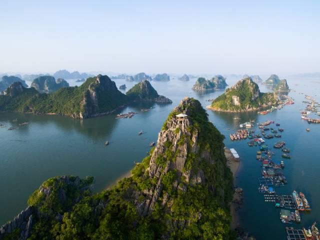 Ha Long Bay, Vietnam

Vietnam's Ha Long Bay is a UNESCO World Heritage Site, and with good reason. The bay is dotted with approximately 1,600 islands and inlets, including many massive greenery-covered limestone pillars.