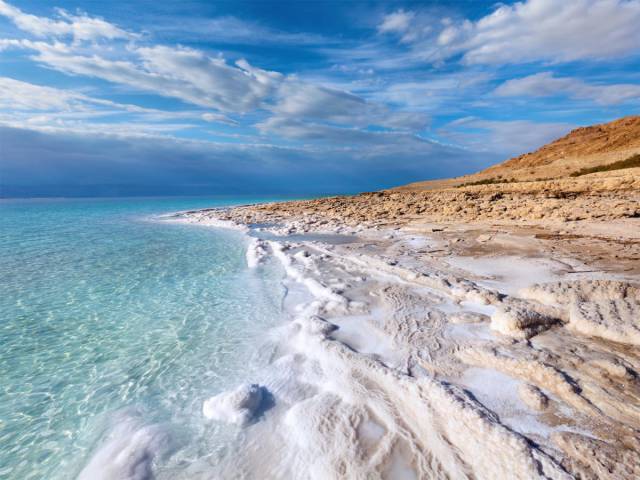 The Dead Sea, Israel

Due to its exceptionally high salt content, there are no animals or life forms besides bacteria in Israel's Dead Sea. You can also easily float in the salt-filled waters, and the mud in the area is said to have healing qualities.