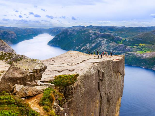 Pulpit Rock, Norway

Pulpit Rock looms almost 2,000 feet over the Lysefjord in Norway. Geologists speculate that the giant mountain plateau was shaped by ice expansion about 10,000 years ago.
