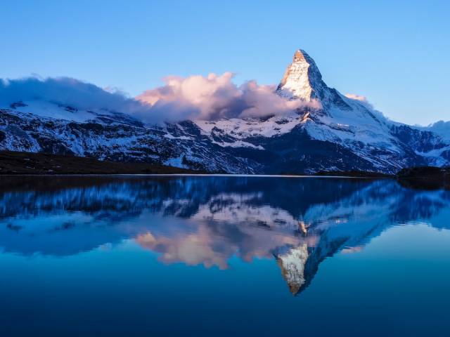 The Matterhorn, Switzerland

The Matterhorn is more than just a classic ride at Disneyland. The actual mountain, located in Switzerland, is known for its "chiseled rock pyramid" look, after which the Disney roller coaster was modeled.