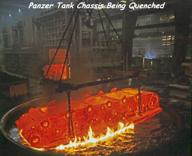 Awesome picture of a red hot Panzer tank Chassis about to be cooled off