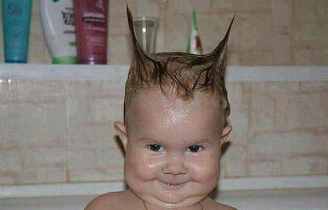 funny picture of kid with horns from his pointed hair