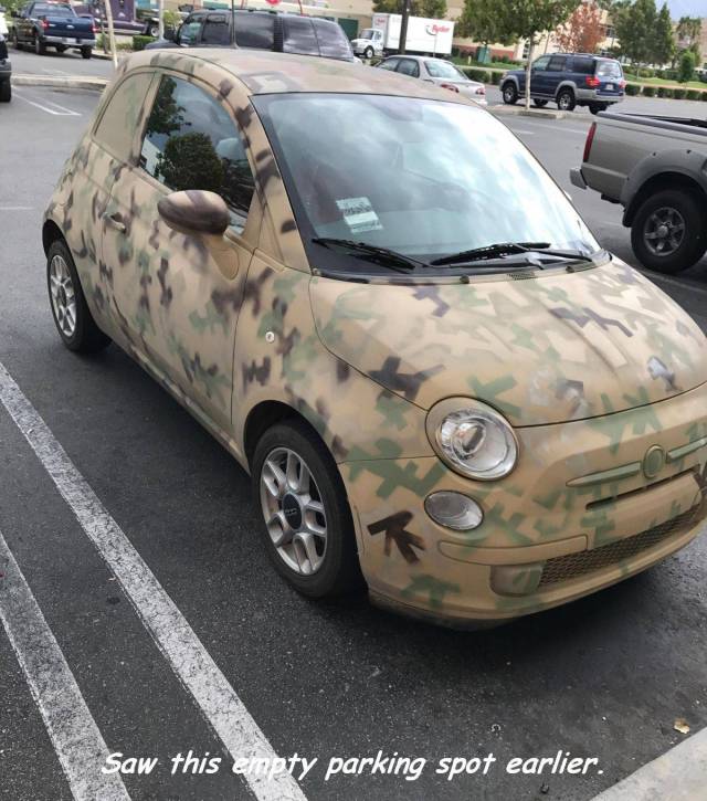 Funny meme of an empty parking spot which is actually a fiat 500 CC that is painted in camouflage