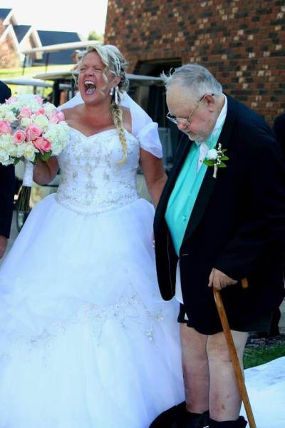 Old couple getting married and the groom is not wearing any pants.
