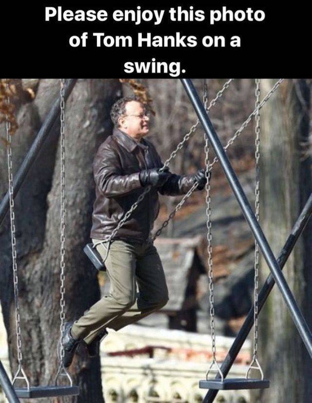 Tom Hanks on a swing.