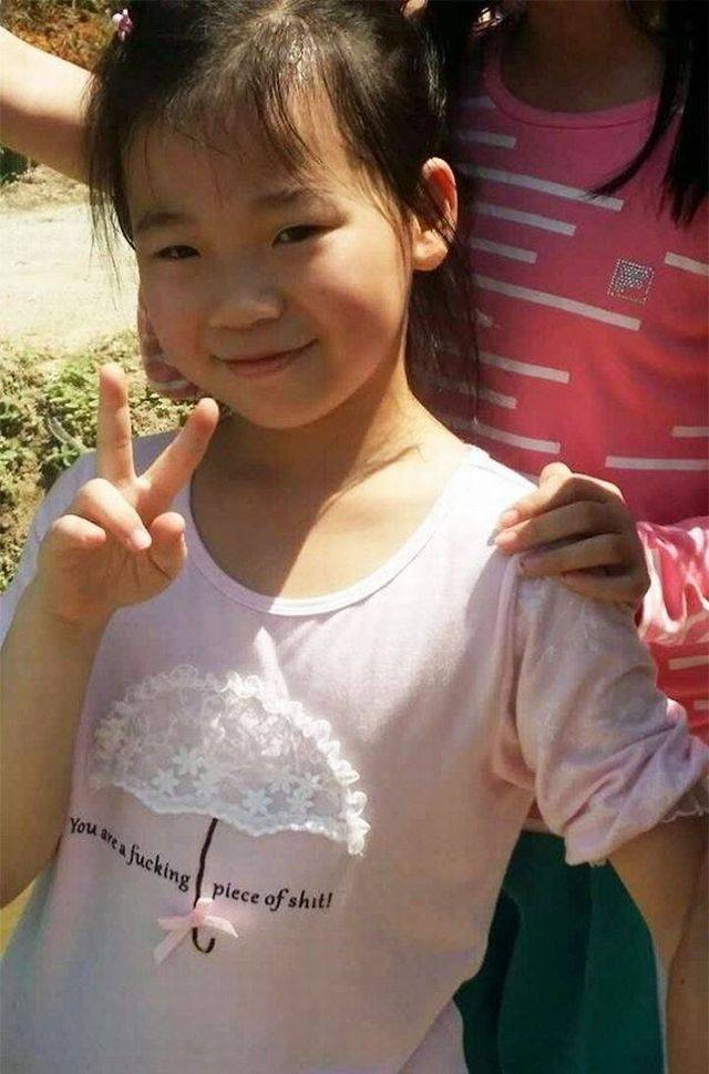 Chinese girl wearing shirt that she probably does not know what it says