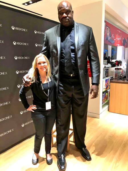 Shaq and a much shorter person at some xbox event