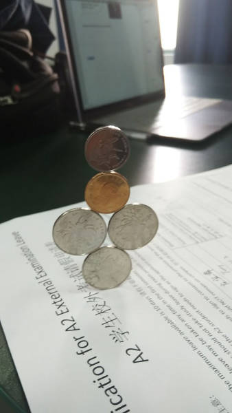 amazingly balanced coins