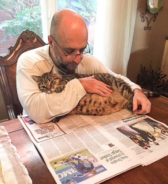 “My cat really loves my dad.”