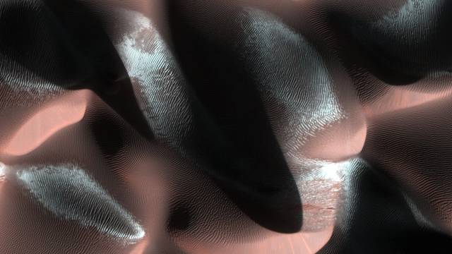 Mars is beautiful in the early morning light. Snow on the dunes.