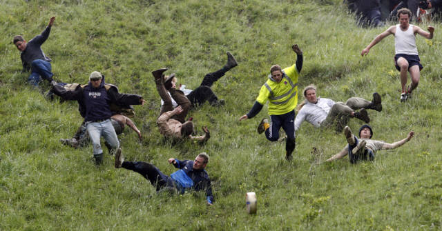 Cheese rolling-Every year a 9 lb round of cheese is sent rolling down the top of Cooper’s Hill, near Gloucester in England and the competitors start chasing after it. However, the cheese may reach speeds of up to 70 mph and the chances of catching it are pretty low. So, the person who crosses the finish line first wins the cheese. If you decide to take part in this competition, you should be extremely careful because the uneven surface of Cooper’s Hill may cause serious injuries.