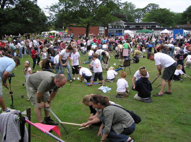 Worm charming is a sport where the competitors are given a 3 m² (9.84 ft²) plot of land and try to extract as many worms as possible out from the ground within 30 minutes. The world record belongs to 10-year-old Sophie Smith who charmed 567 worms to the surface at the World Worm Charming Championships in 2009.