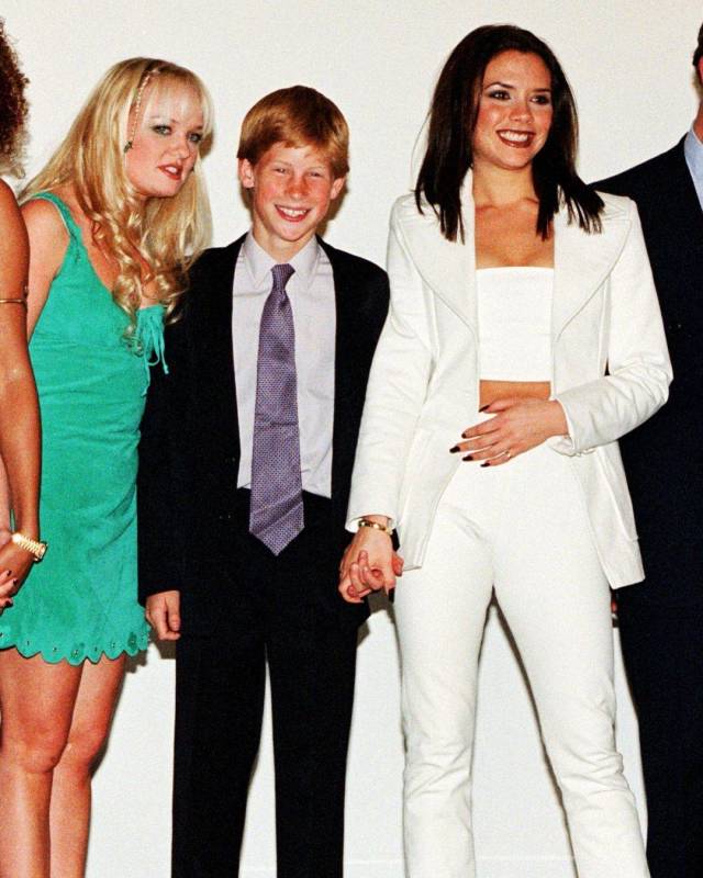 Prince Harry holding Victoria Beckham’s hand, 1997