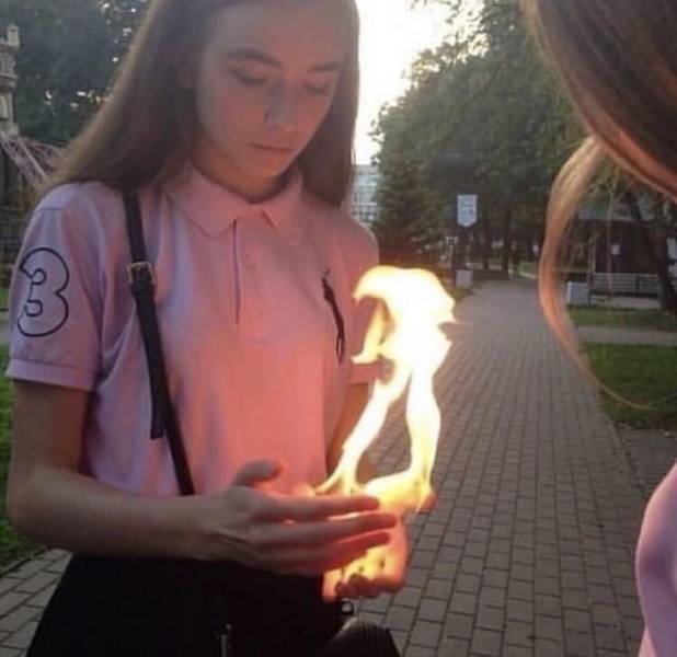 girl holding fire aesthetic