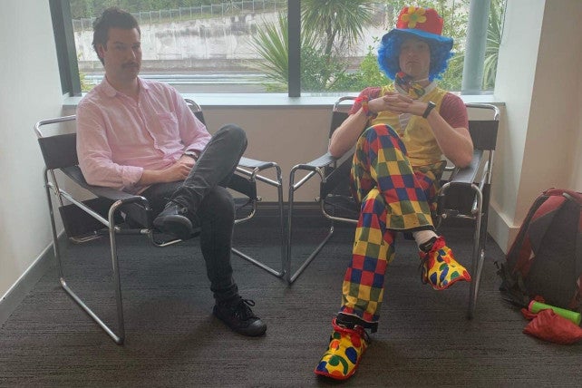 man brings clown to redundancy meeting