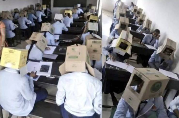 students wearing cardboard boxes