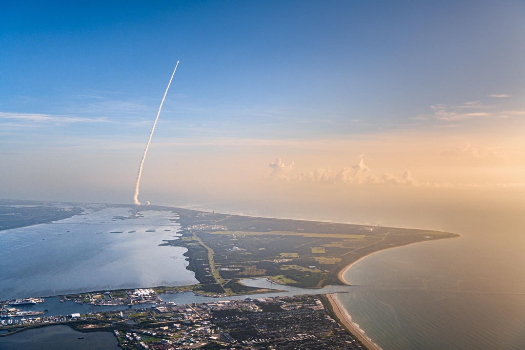 photo of rocket launch taken from airplane