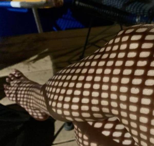 The shadow of this patio table makes it look like I’m wearing fishnets