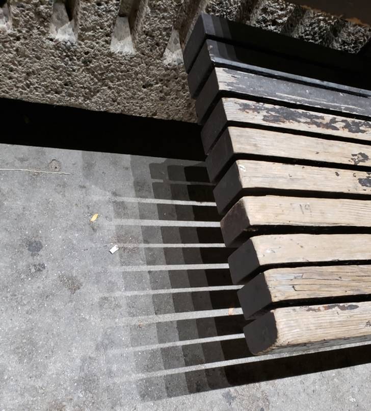 "It looks like the shadow of this bench is falling into pixels."