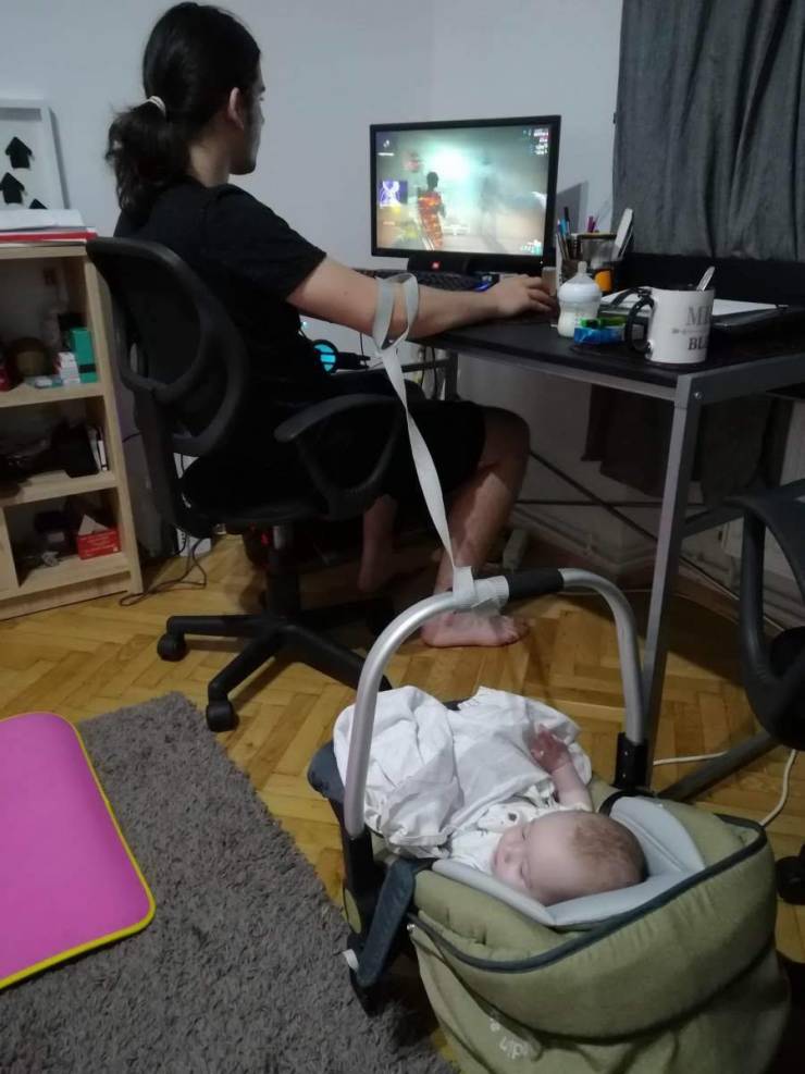 dad with baby on computer - Bl
