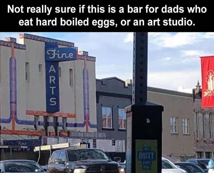 billboard - Not really sure if this is a bar for dads who eat hard boiled eggs, or an art studio. Fine R T S Tin Dutti