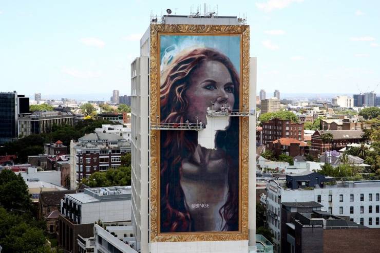 cool pics - giant advertisement of woman looks funny
