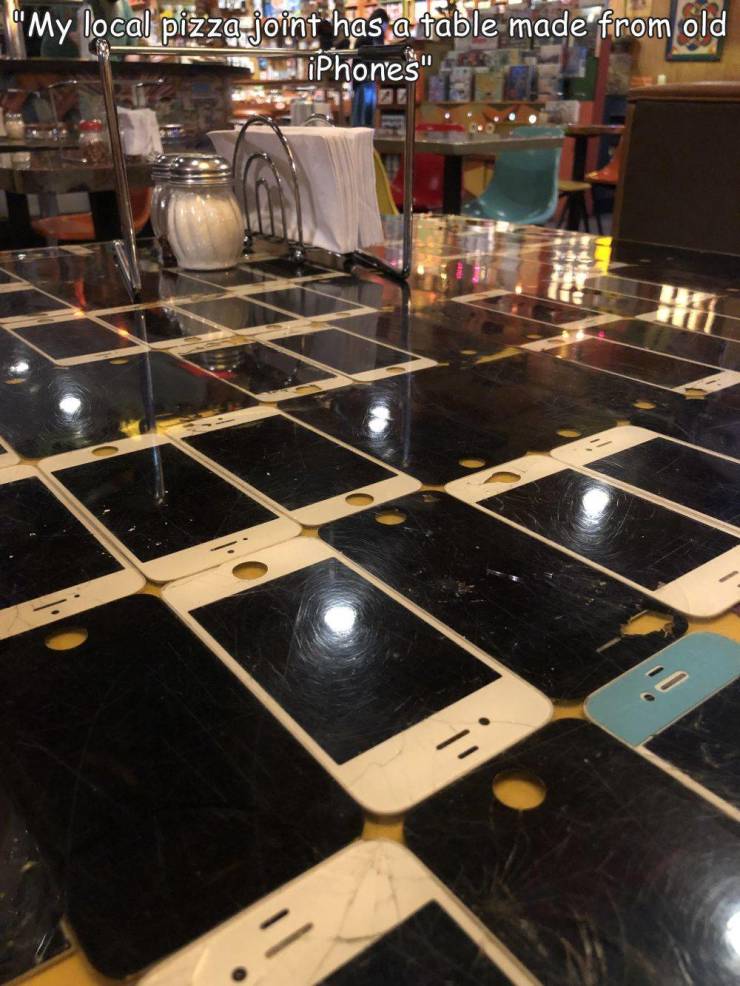 fun randoms - cool photos - floor - "My local pizza joint has a table made from old iPhones" 1 .