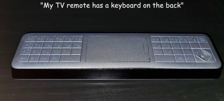 funny photos - electronics - "My Tv remote has a keyboard on the back" R Sa F