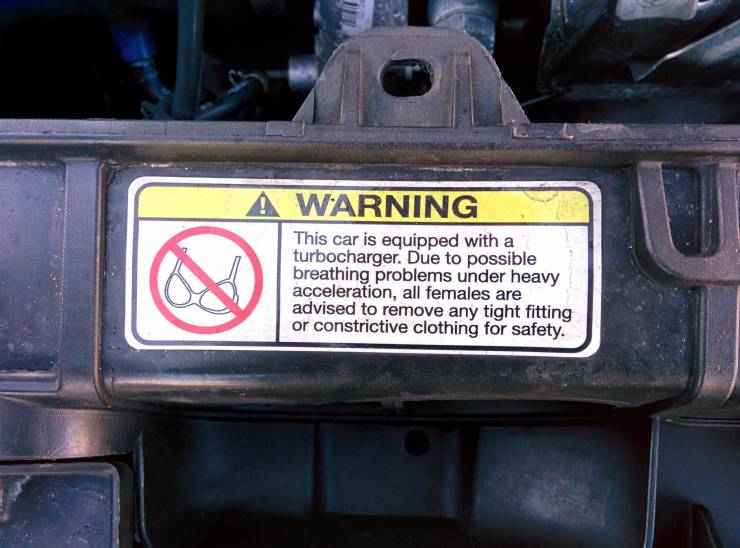 funny photos - warning sticker car - A Warning This car is equipped with a turbocharger. Due to possible breathing problems under heavy acceleration, all females are advised to remove any tight fitting or constrictive clothing for safety. U