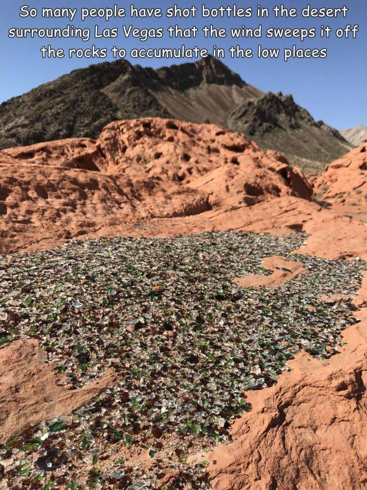 funny photos - soil - So many people have shot bottles in the desert surrounding Las Vegas that the wind sweeps it off the rocks to accumulate in the low places