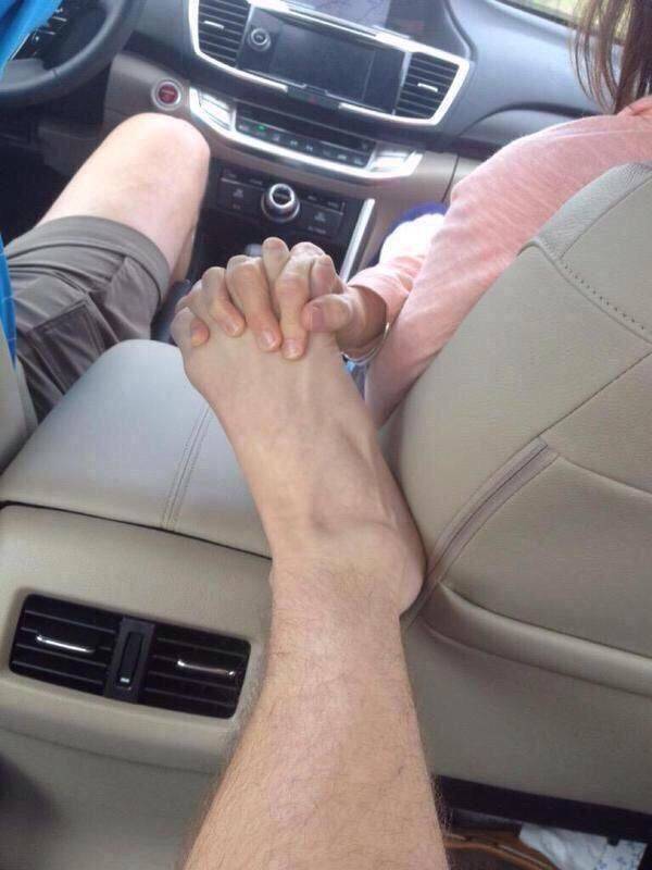 random pics - hand holding foot
