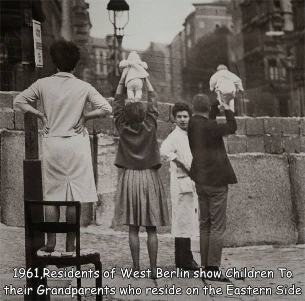fantastic photos - rare pictures of history - 1961, Residents of West Berlin show Children To their Grandparents who reside on the Eastern Side