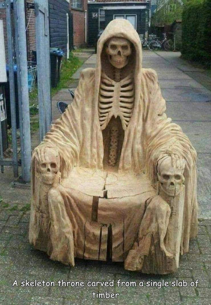 funny photos - cool pics - halloween chainsaw carvings - 64 A skeleton throne carved from a single slab of timber