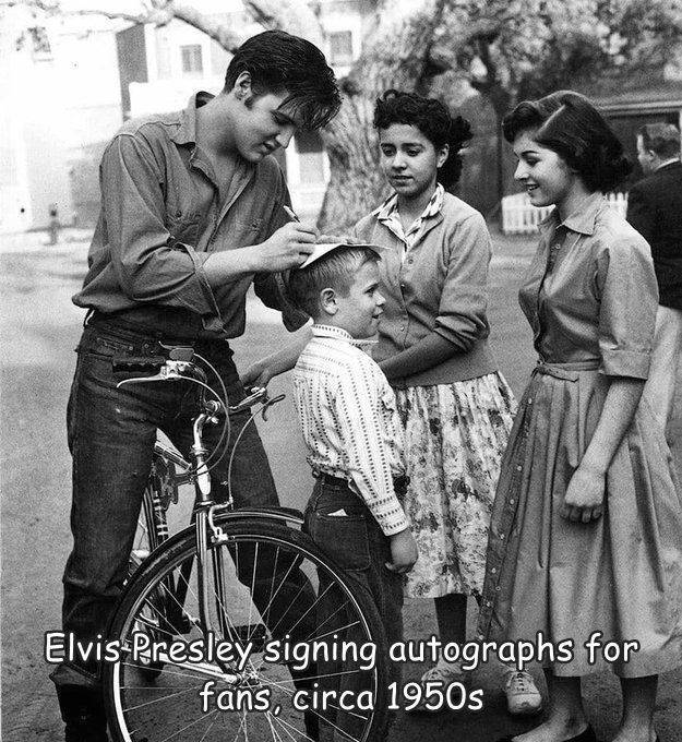fun randoms - poignant photographs - Elvis Presley signing autographs for fans, circa 1950s