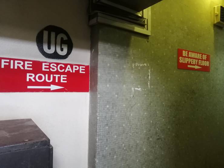 fun randoms - funny photos - signage - Ug Be Aware Of Slippery Floor Fire Escape Route