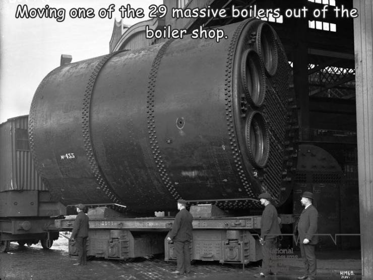 monochrome photography - Moving one of the 29 massive boilers, out of the boiler shop N 433 National H1968.