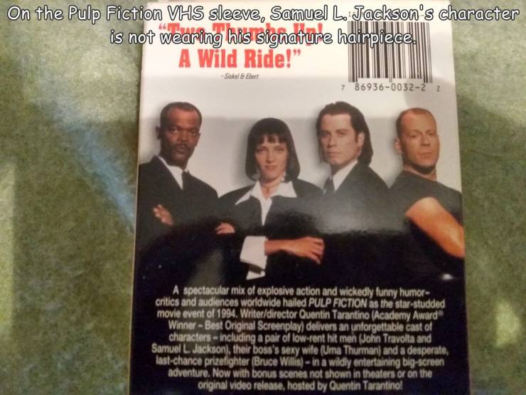 album cover - On the Pulp Fiction Vhs sleeve, Samuel L. Jackson's character is not wearing his signature hairpiece, A Wild Ride! Schal & Elbert 78693600322 2 A spectacular mix of explosive action and wickedly funny humor critics and audiences worldwide ha