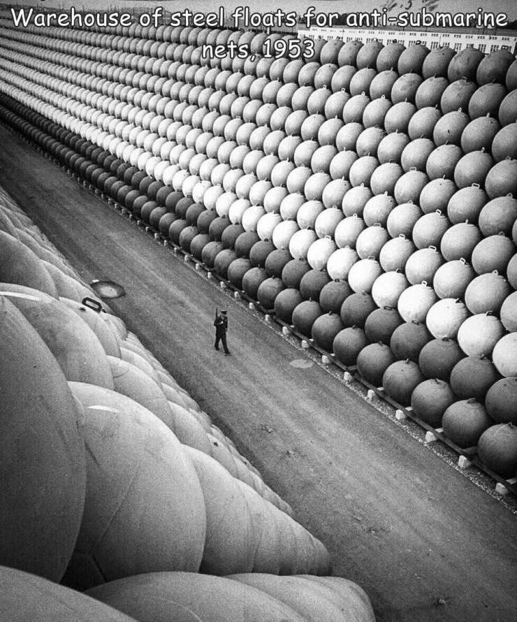 funny photos - sea mines - Warehouse of steel floats for antisubmarine nets, 1953 Perer e